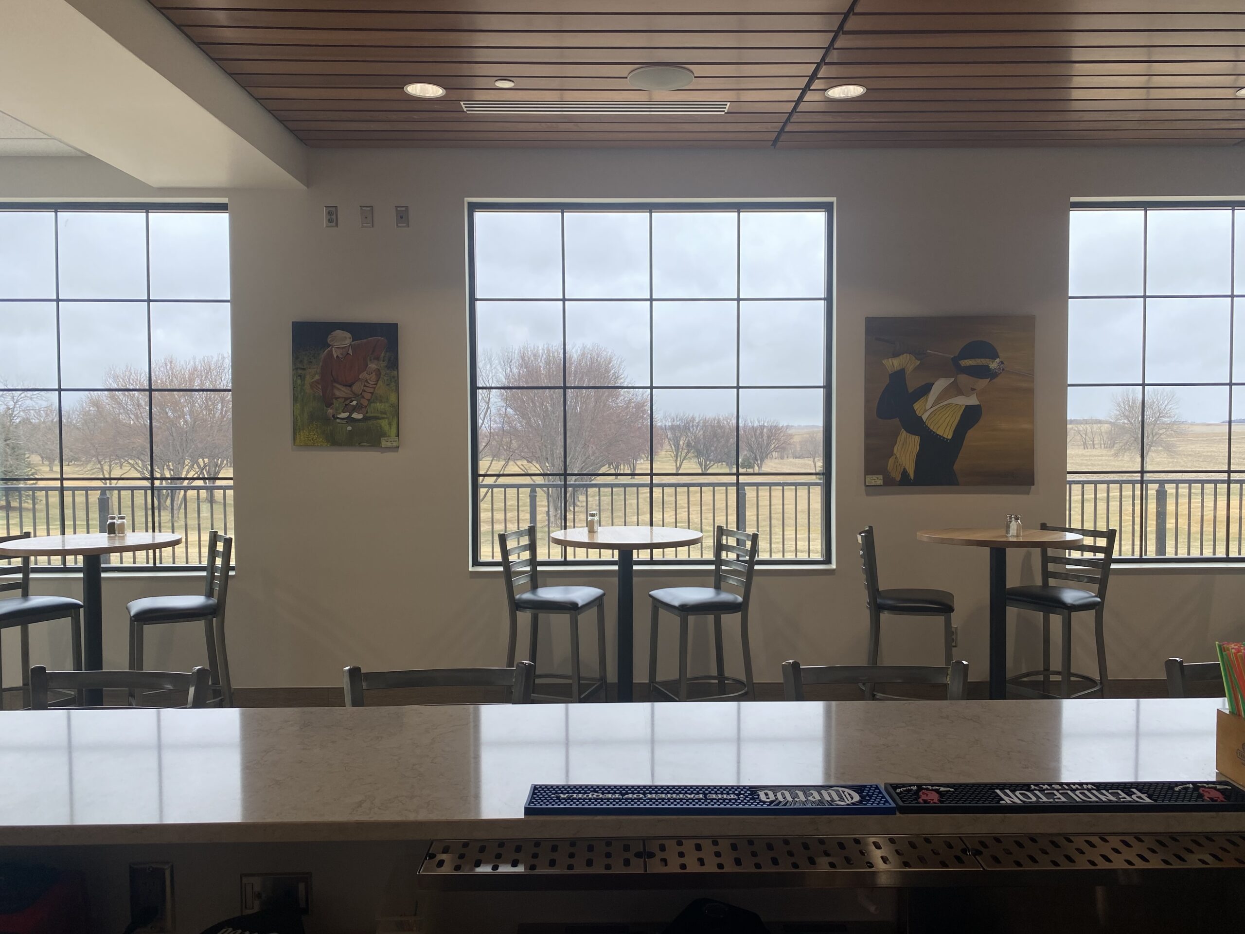 Bar seating overlooking the course